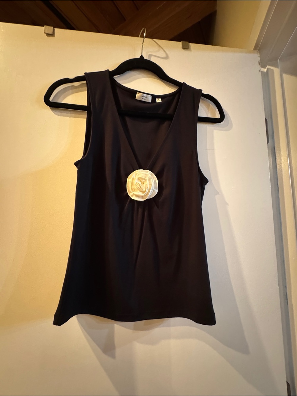 Aritzia Black Sleeveless V-Neck Tank with Cream Floral Accent